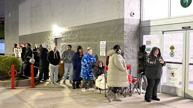 Guests wait in line outside to shop Target Black Friday Deals and Taylor Swift Exclusive Products on November 29, 2024 in Jersey City, New Jersey. (Photo by Dave Kotinsky/Getty Images)