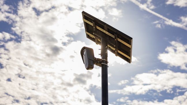 FILE – A photo of a Flock Safety camera installed in a neighborhood. The cities of Sedro-Wooley and Mount Vernon will be using the cameras that can record a vehicle's description and capture its license plate to help police identify vehicles involved in criminal activities.(Photo courtesy: Flock Safety){p}{/p}