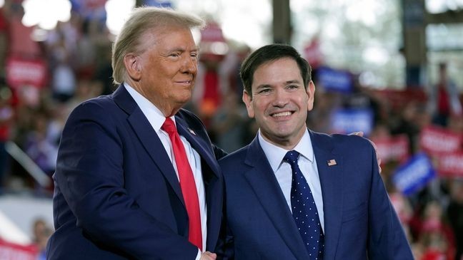 FILE - Republican presidential nominee former President Donald Trump greets Sen. Marco Rubio, R-Fla., during a campaign rally at J.S. Dorton Arena, Nov. 4, 2024, in Raleigh, N.C. (AP Photo/Evan Vucci, File)
