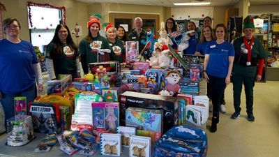 Image for story: Photos: Toys arrive at JBLM for the KOMO Toy Drive at Santa's Castle