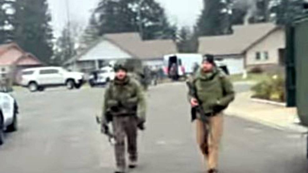 Image for story: Rape suspect, driver barricaded in Graham home arrested after SWAT response  