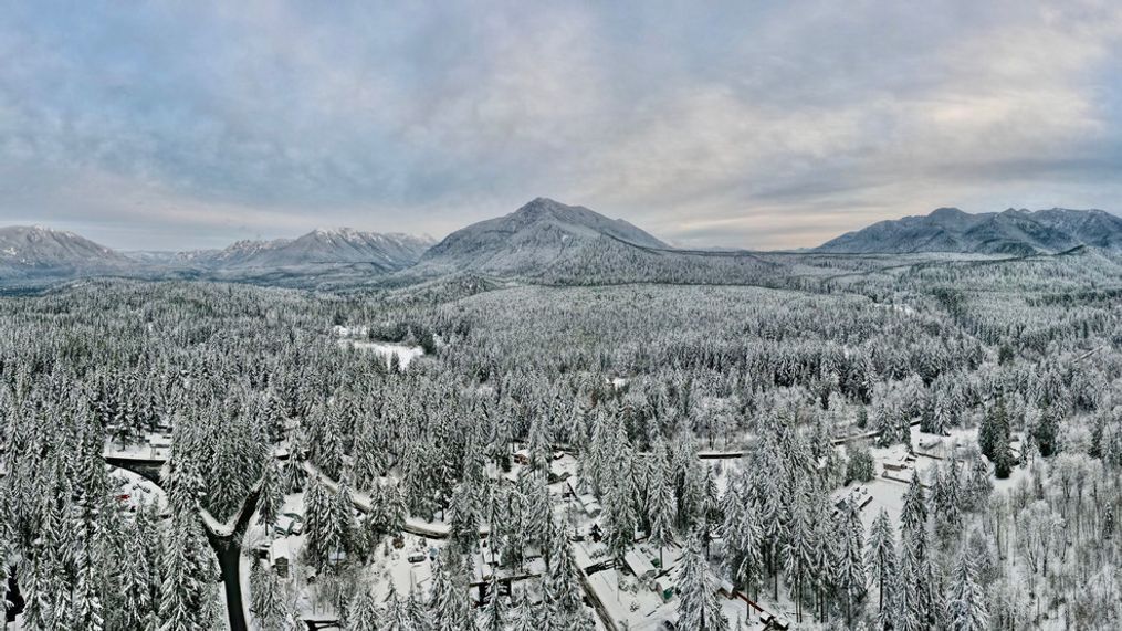 The sunset in North Bend as snow blankets the trees and mountains. (Photo Courtesy: Patrick Winter via KOMO Chime-In)
